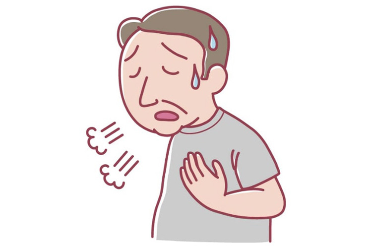 息切れしている男性